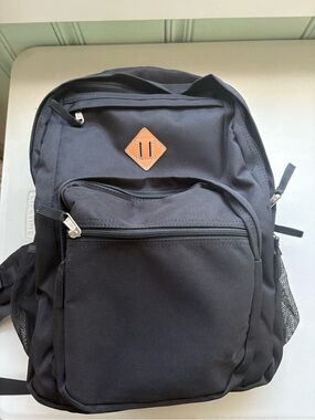 Classic Black Backpack with Leather Accent